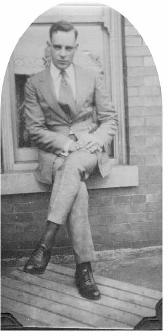 George Kellogg Hess, Sr. on a window sill